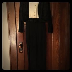 Sleeveless jumpsuit with long sleeve jacket